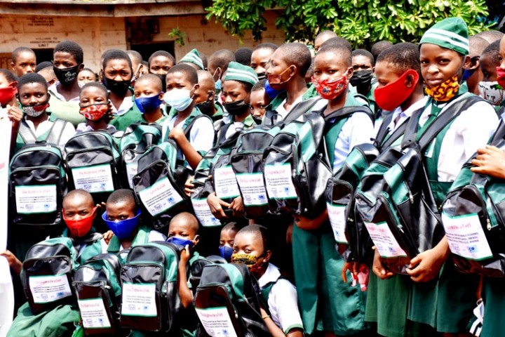 A cross section of the female beneficiaries after receiving the school bags and books on 23 June 2021
